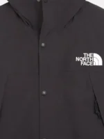 The North Face x Sky High Farm Rain Jacket close-up view showing texture, stitching, and detail