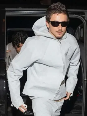 The front profile of the Timothee Chalamet Grey Hooded Jacket showing the zip closure and hood detail.