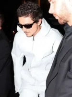 A full look at the Timothee Chalamet Grey Hooded Jacket featuring a modern urban silhouette.