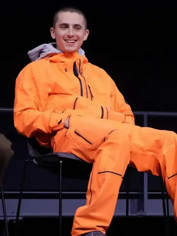 The front side of the Timothee Chalamet Marty Supreme Orange Tracksuit showcasing the zip detail and ribbed cuffs.