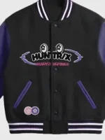 A detailed close-up of the premium embroidery and fabric texture on the Vandy x McDonalds HuntrX Varsity Jacket.