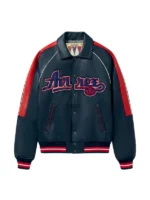 Front view of Avirex The Kings navy leather varsity jacket with Kings script logo, red sleeve panels and tri-color rib knit cuffs