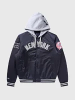 Full front product shot of BBC x NY Yankees navy satin hooded jacket with NEW YORK arch lettering, Yankees badge and grey hood