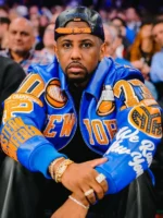 Rapper Fabolous courtside at Madison Square Garden wearing the New York Knicks Pelle Pelle blue and orange leather jacket