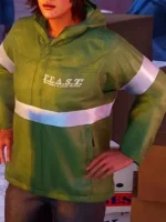 Close-up of Gloria Davila in green F.E.A.S.T. jacket showing chest logo white stripe and snap-tab zipper in Spider-Man PS4