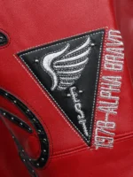 Close-up of 1978 Alpha Bravo triangular patch with winged caduceus embroidery on Pelle Pelle American Bruiser jacket sleeve