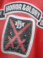 Close-up of Honor and Glory 1st Division shield patch with red cross and stud detailing on Pelle Pelle American Bruiser jacket
