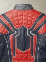 Close-up of large spider emblem on back of Iron Spider vegan leather jacket with quilted red shoulder grid and grey strips