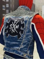 Back view of Spider-Punk blue denim vest showing large black and white SFM/N cross punk band logo graphic and studded collar band