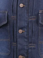 Close-up of the Triumph branded copper buttons on the Jax denim jacket.