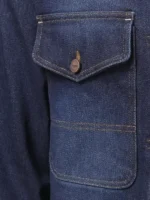 Close-up of the flap chest pocket with button closure on the Triumph Jax jacket.