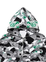 BAPE x Hidden STA Camo Tiger Hoodie close-up hooded view showing camo print and hood details