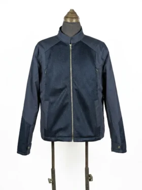 Full-frontal product view of the screen-accurate blue Captain America Steve Rogers mesh-paneled jacket zipped up on a studio mannequin.