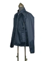 Side-angle profile display of the navy blue Captain America Winter Soldier jacket on a mannequin, highlighting the woven mesh texture on the front and sleeve.
