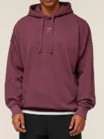 Gymshark Power Hoodie burgundy front view showing clean pullover design and sharp fit