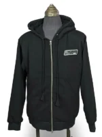 Flat front studio display of the Calvin Klein relaxed fit black hoodie with visible neck tag and tonal branding.