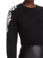 Reba McEntire The Voice S28 Black Embroidered Sweater close-up view showing stitching and embroidery detail
