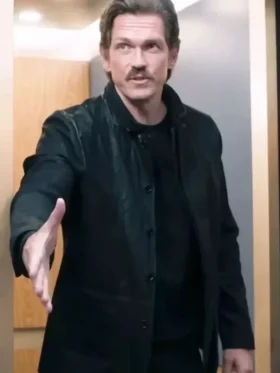 S02 Steve Howey Black Leather Jacket view showing black leather texture, collar, and clean fit
