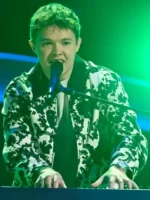 The Voice S28 Max Cooper III Cow Print Jacket front view showing cow print pattern, collar, and closure