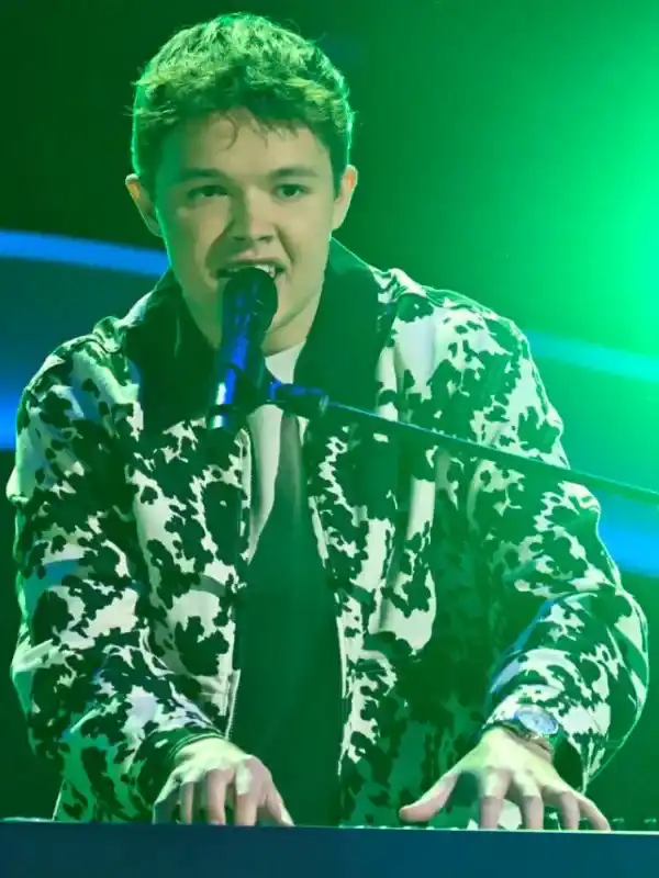 The Voice S28 Max Cooper III Cow Print Jacket Front View The Voice S28 Max Cooper III Cow Print Jacket front view showing cow print pattern, collar, and closure