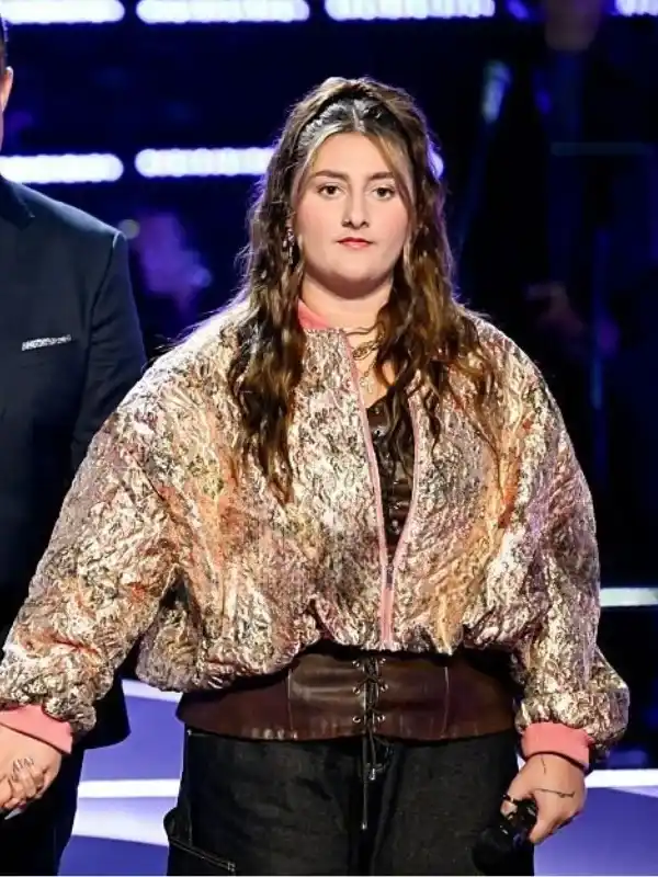 The Voice S29 Mikenley Brown Bomber Jacket Front View The Voice S29 Mikenley Brown Bomber Jacket front view showing collar, closure, pockets, and bomber design