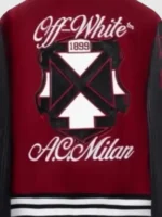 Close profile display showcasing the rich leather texture and heavy wool weave on the AC Milan Off-White Ruben Varsity Jacket.
