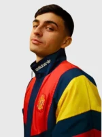Side view of the Adidas Backyard Legends Pedri Jacket showing the rib knitted cuffs.
