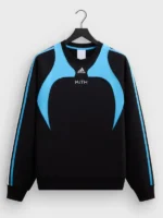 Close view highlighting the premium weave and dual tone knit pattern of the Adidas Kith Lionel Messi Fleece Sweater.