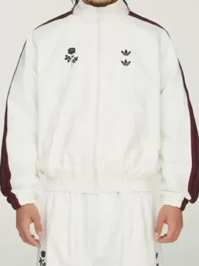 A premium standalone layout presentation of the clean Adidas x Willy Chavarria Woven Jacket.