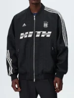 A premium standalone profile presentation of the sleek black Adidas x Kith Lionel Messi Bomber Jacket.