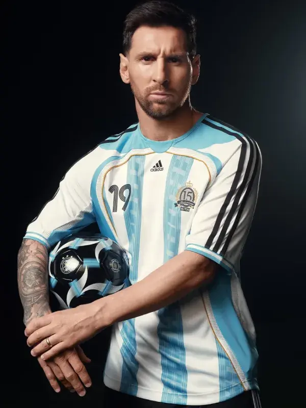 Side layout view showcasing the premium sports tailoring of the Adidas x Kith Messi Football Jersey.