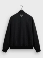 Clean rear profile view showing the minimal branding texturing on the Adidas x Kith Lionel Messi Bomber Jacket.