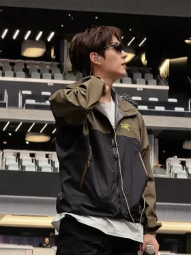 A premium standalone presentation of the olive green and black Arirang Suga Stanford Stadium Jacket.
