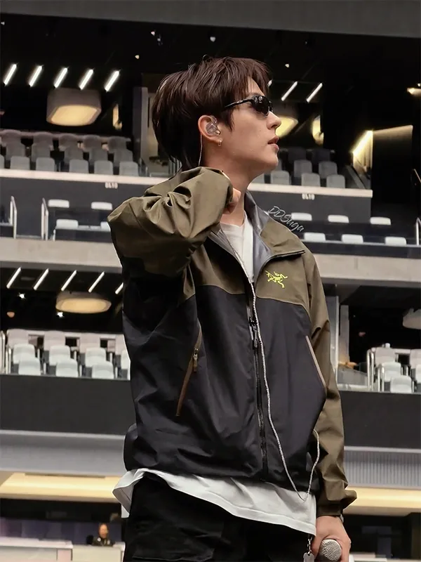 A premium standalone presentation of the olive green and black Arirang Suga Stanford Stadium Jacket.