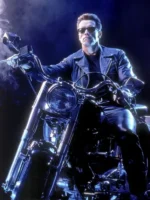 Arnold Schwarzenegger as the T-800 on motorcycle in black leather jacket and dark sunglasses from Terminator 2 Judgment Day 1991