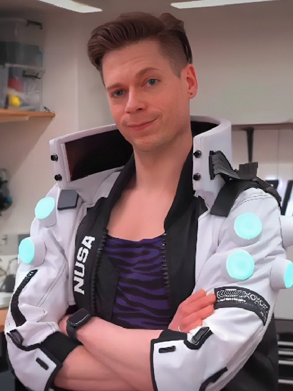 Cyberpunk 2077 NUSA Infiltrator cosplay jacket front view showing NUSA branding stand-up collar teal arm elements and front zipper