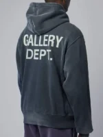 The back view of the Gallery Dept Paint Logo Hoodie in a clean dark grey tone.