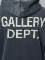 Close up view of the Gallery Dept Paint Logo Hoodie showing the logo detail.