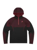 Full front profile of the red Gymshark Onyx 5.0 Seamless Hoodie showing the half zipper.