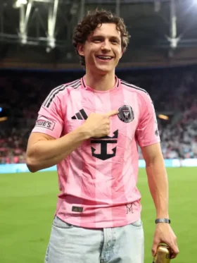 A clean flat layout profile showcasing the vibrant pink hue of the Tom Holland Inter Miami Jersey.