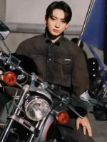 A front view of the Jung Kook Calvin Klein Denim Jacket in dark brown denim.