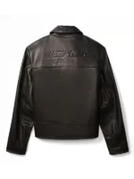 The clean back profile of the black Jung Kook Calvin Klein Leather Jacket showing its tailored fit.