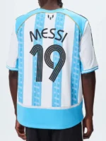 Clean rear profile view showing the tailored name detailing on the back of the Adidas x Kith Messi Football Jersey.