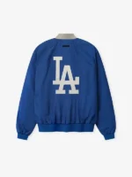 Clean back profile presentation of the structured blue LA Dodgers Essentials Half Zip Jacket.
