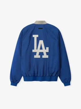 Clean back profile presentation of the structured blue LA Dodgers Essentials Half Zip Jacket.
