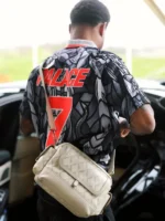 Clean rear profile view showing the distinctive geometric panels of the Nike X Palace World Cup England Jersey.