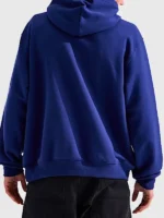 Back view of the blue The North Face x US Ski and Snowboard Hoodie.