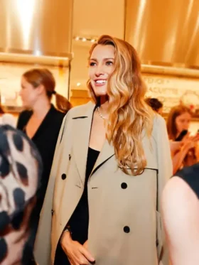 A standalone presentation of the light olive green textile on the NYC 2026 Blake Lively Trench Coat.