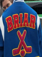 The clean back profile of the structured blue wool Belmont Cameli Blue Varsity Jacket.