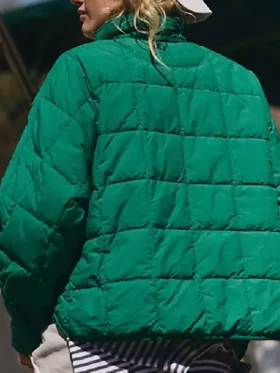 Clean rear view focusing on the uniform horizontal quilting panels of the Pippa Packable Dark Green Puffer Jacket.